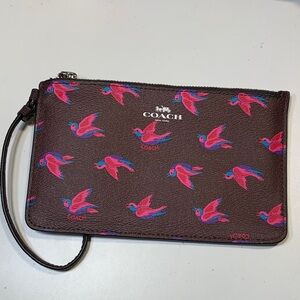 Coach Dark Brown Wristlet with Pink Bird Design